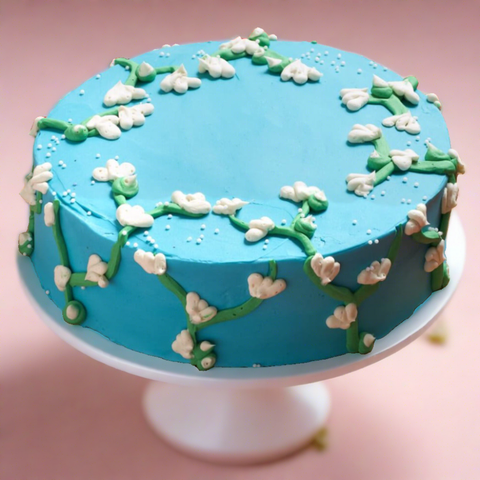 Beautiful blue based Floral Cake. Perfect for your next event.  We offer cake delivery in Dubai. Place your order online for delivery.