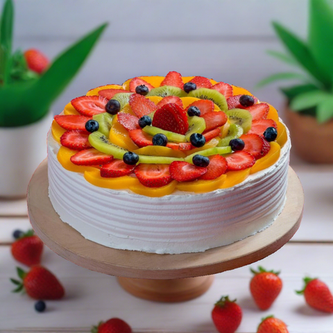 Beautiful Fruit Cake with a fresh vanilla based sponge cake! Only here at Looshi's! We offer cake delivery in Dubai. Order online for delivery. 