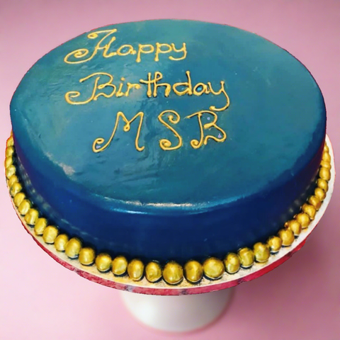 blue and golden birthday cake
