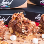 Brookie Bites: Heavenly Layers of Cookie, Fudge Gooey Brownie Topped Off With Toasted Marshmallow And Salted Pretzels! Order these delicious brownies for delivery in Dubai. Order online.