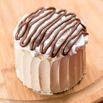 Chocolate with Peanut Butter cake. Delicious chocolate moist cake with creamy peanut butter filling topped with whipping cream and chocolate sauce. Our delicious peanut butter cake is perfect for birthdays, or any other special occasion. Order online for delivery in Dubai